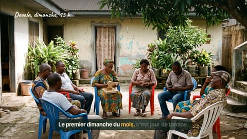 The Sunday meeting in a Douala courtyard, circled by hand.